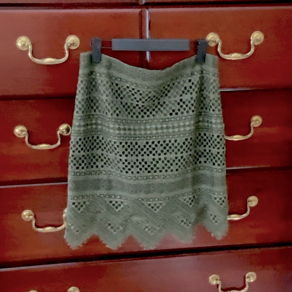 Banana Republic Olive green lace skirt is fully lined.